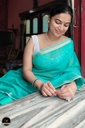 Green Maheswari Saree With Thin Zari Border, Full Body Buta Work with Contrast Yellow Unstitched Blouse Piece-0